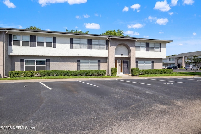 695 A1A N Unit 123, Ponte Vedra Beach, FL 32082 - view of property with uncovered parking