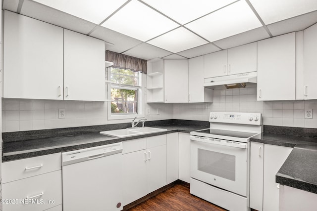 695 A1A N Unit 123, Ponte Vedra Beach, FL 32082 - kitchen with white appliances, under cabinet range hood, a sink, open shelves, and white cabinetry