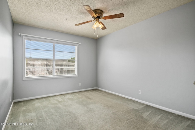 695 A1A N Unit 123, Ponte Vedra Beach, FL 32082 - carpeted spare room with ceiling fan, baseboards, and a textured ceiling