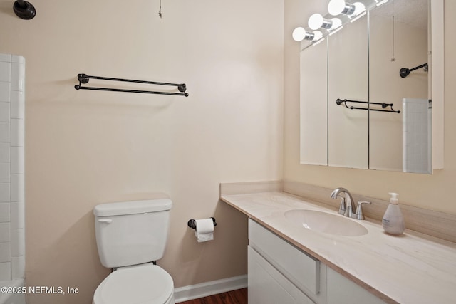 695 A1A N Unit 123, Ponte Vedra Beach, FL 32082 - bathroom with toilet, vanity, a shower, and baseboards