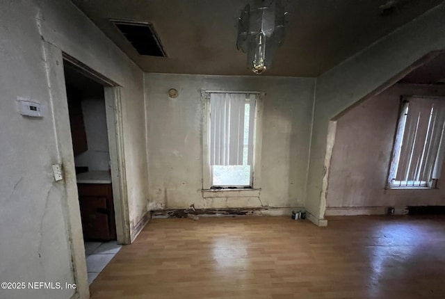 1419 W 24th St, Jacksonville, FL 32209 - spare room with wood finished floors and healthy amount of natural light