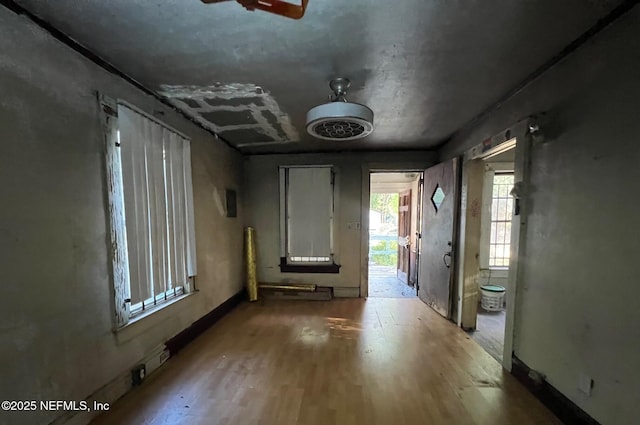 1419 W 24th St, Jacksonville, FL 32209 - empty room featuring wood finished floors and baseboards