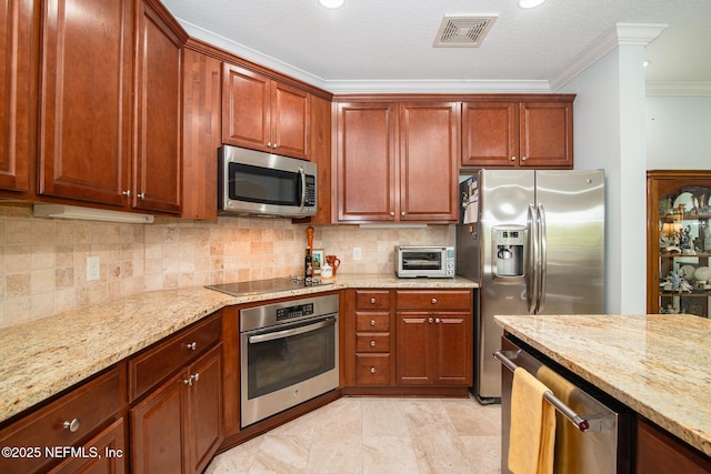 4300 S Beach Pkwy Unit 4306, Jacksonville Beach, FL 32250 - kitchen with stainless steel appliances, light stone countertops, crown molding, decorative backsplash, and recessed lighting