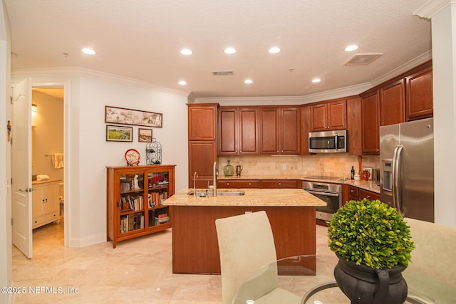 4300 S Beach Pkwy Unit 4306, Jacksonville Beach, FL 32250 - kitchen featuring stainless steel appliances, a sink, ornamental molding, an island with sink, and decorative backsplash