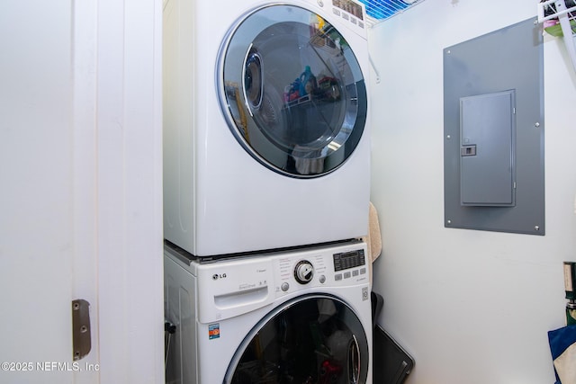 4300 S Beach Pkwy Unit 4306, Jacksonville Beach, FL 32250 - washroom featuring stacked washer / dryer and electric panel