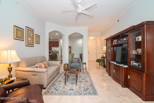 4300 S Beach Pkwy Unit 4306, Jacksonville Beach, FL 32250 - living room featuring a ceiling fan, arched walkways, and crown molding
