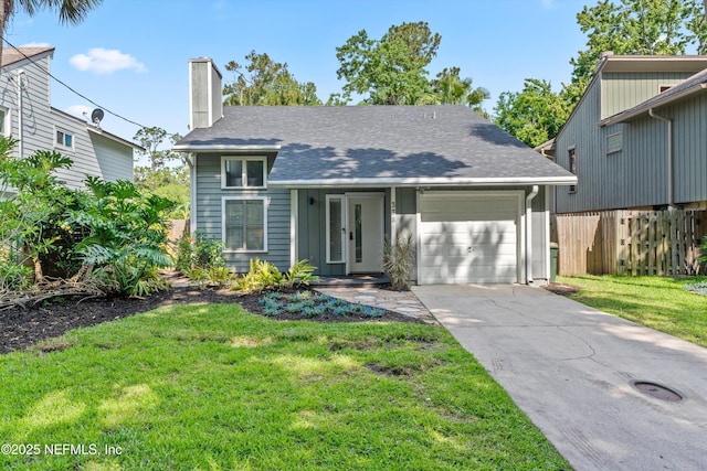 338 Magnolia St, Atlantic Beach, FL 32233 - view of front of house featuring a chimney, an attached garage, concrete driveway, and a shingled roof
