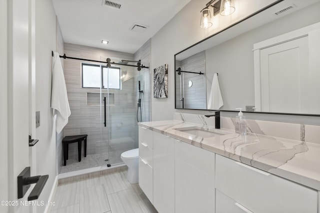 338 Magnolia St, Atlantic Beach, FL 32233 - bathroom featuring toilet, vanity, and a shower stall