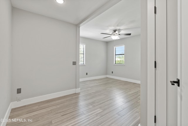 338 Magnolia St, Atlantic Beach, FL 32233 - unfurnished room with a ceiling fan, light wood-style floors, and baseboards