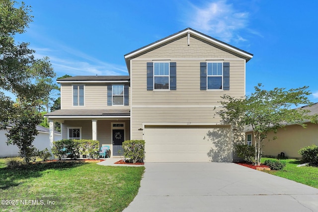 137 Codman Dr, Saint Augustine, FL 32084 - view of front facade with an attached garage, driveway, a front yard, and covered porch