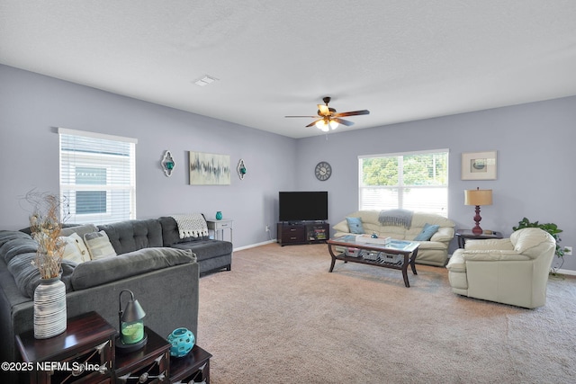 137 Codman Dr, Saint Augustine, FL 32084 - living room featuring carpet flooring, a ceiling fan, and baseboards