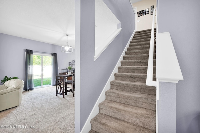 137 Codman Dr, Saint Augustine, FL 32084 - stairway featuring carpet flooring