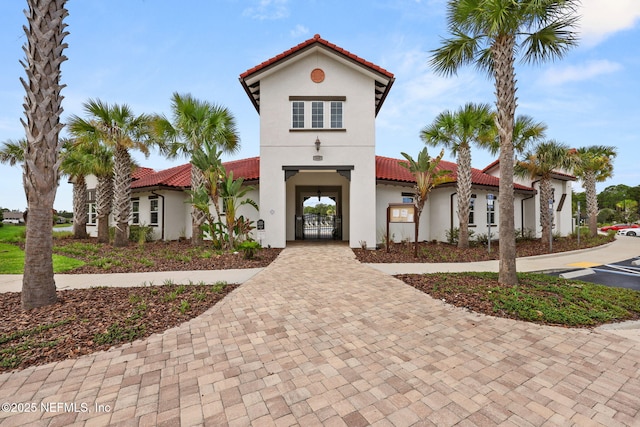 137 Codman Dr, Saint Augustine, FL 32084 - view of front of home featuring stucco siding and a tile roof