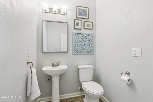 864 Collinswood Dr W, Jacksonville, FL 32225 - bathroom with baseboards and toilet