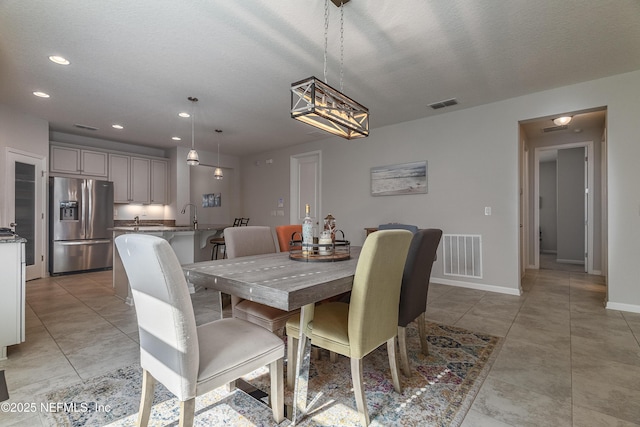 497 Convex Ln, Saint Augustine, FL 32095 - dining space with recessed lighting, baseboards, light tile patterned floors, a chandelier, and a textured ceiling
