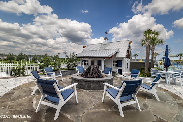 497 Convex Ln, Saint Augustine, FL 32095 - view of patio / terrace with a fire pit