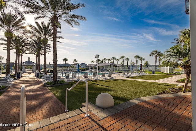 497 Convex Ln, Saint Augustine, FL 32095 - view of property's community with a gazebo, a swimming pool, and a yard