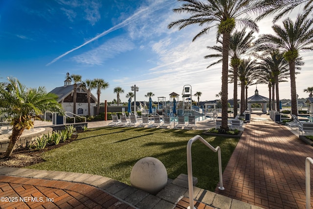 497 Convex Ln, Saint Augustine, FL 32095 - view of green lawn with a gazebo and a pool