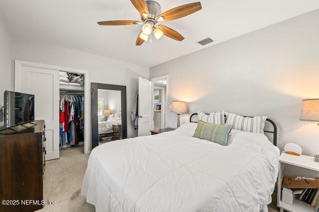 6500 Altama Rd, Jacksonville, FL 32216 - bedroom featuring light carpet, a closet, and ceiling fan