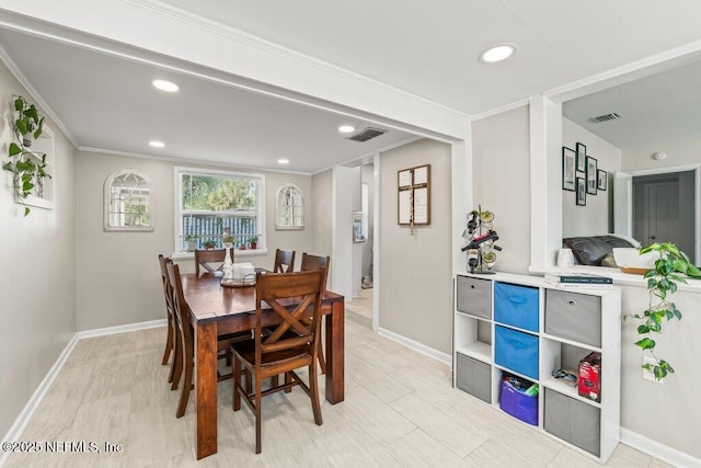 6500 Altama Rd, Jacksonville, FL 32216 - dining space with baseboards, recessed lighting, and crown molding