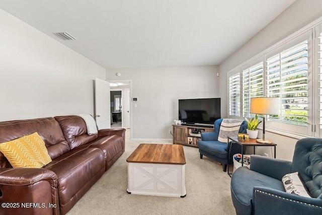 6500 Altama Rd, Jacksonville, FL 32216 - living room featuring light colored carpet and baseboards