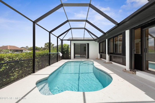13 Clarendon Ct S, Palm Coast, FL 32137 - outdoor pool featuring a patio and glass enclosure
