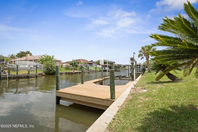 13 Clarendon Ct S, Palm Coast, FL 32137 - dock with boat lift, a water view, and a residential view