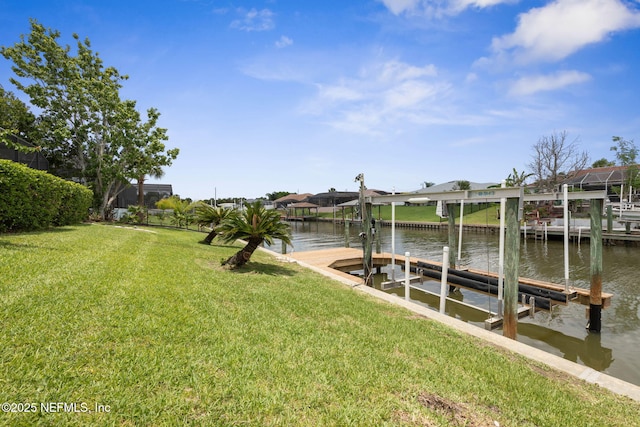 13 Clarendon Ct S, Palm Coast, FL 32137 - dock with boat lift, a water view, a yard, and a residential view
