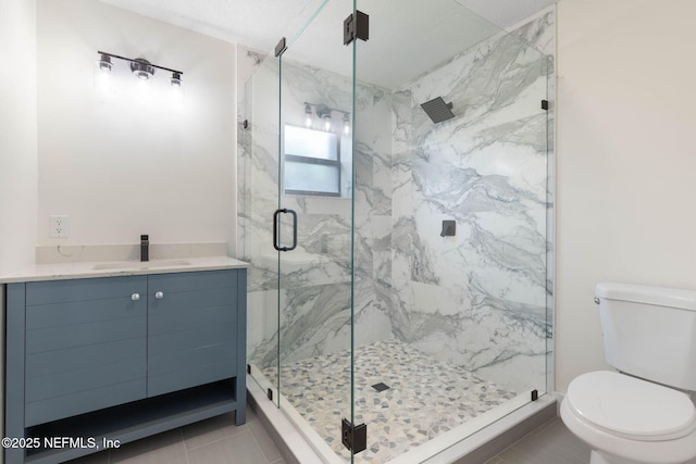 13 Clarendon Ct S, Palm Coast, FL 32137 - bathroom with toilet, a marble finish shower, vanity, and tile patterned flooring