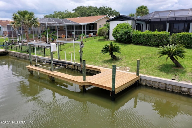 13 Clarendon Ct S, Palm Coast, FL 32137 - dock with a water view, a yard, and a lanai