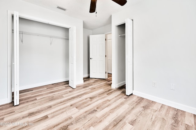 159 Twine St, Saint Augustine, FL 32084 - unfurnished bedroom featuring wood finished floors, baseboards, and ceiling fan