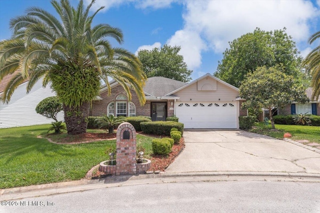 1275 Pirates Cove Ln, Fleming Island, FL 32003 - view of front facade with an attached garage, driveway, brick siding, and a front yard