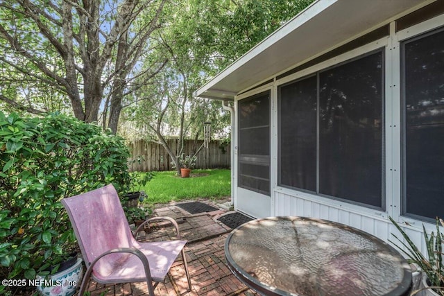 1275 Pirates Cove Ln, Fleming Island, FL 32003 - view of patio / terrace featuring a sunroom
