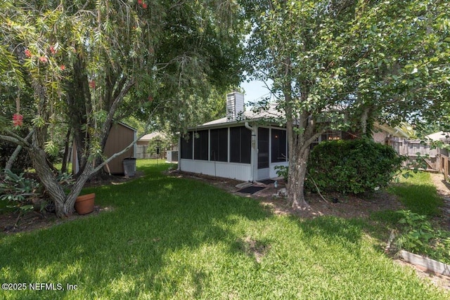 1275 Pirates Cove Ln, Fleming Island, FL 32003 - view of yard featuring a sunroom
