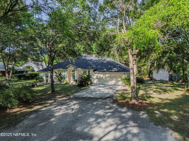 96428 Chester Rd, Yulee, FL 32097 - single story home featuring driveway, a garage, a front yard, and roof with shingles