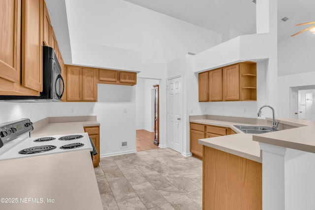 96428 Chester Rd, Yulee, FL 32097 - kitchen with a sink, open shelves, black microwave, range with electric stovetop, and light countertops
