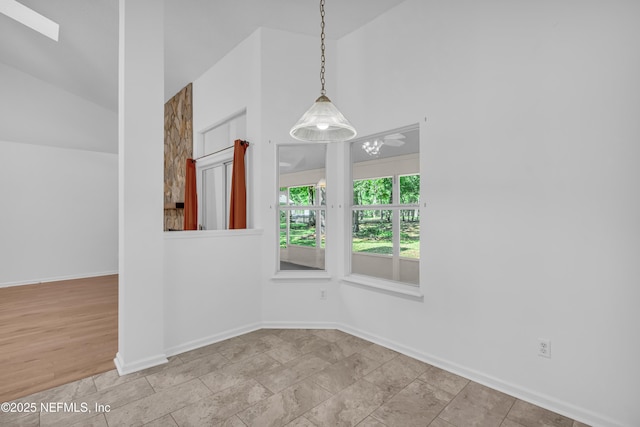 96428 Chester Rd, Yulee, FL 32097 - unfurnished room with baseboards and high vaulted ceiling