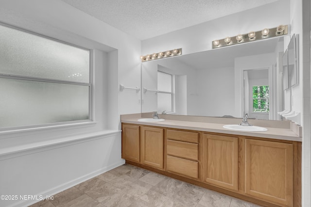 96428 Chester Rd, Yulee, FL 32097 - bathroom with double vanity and a textured ceiling