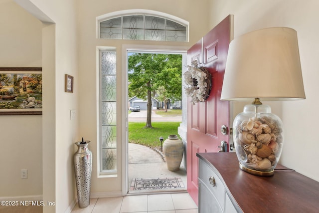 foyer entrance featuring light tile patterned floors