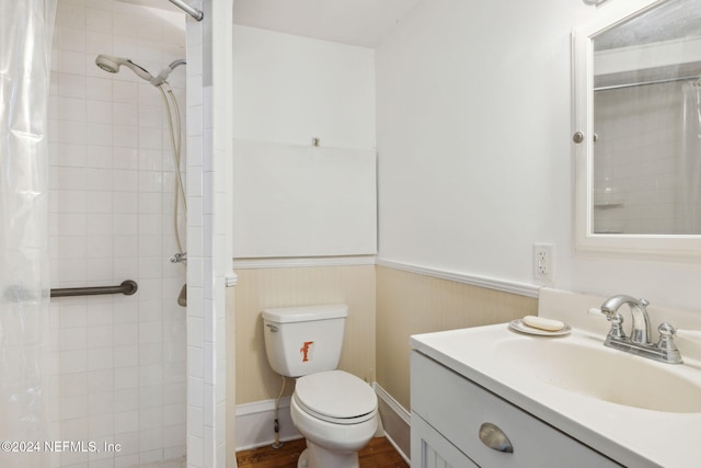 2143 Myra St, Jacksonville, FL 32204 - full bathroom featuring tiled shower, wainscoting, toilet, and vanity