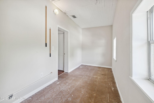 2143 Myra St, Jacksonville, FL 32204 - empty room featuring attic access, baseboards, and a smoke detector