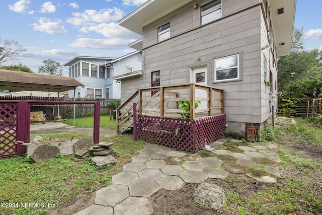 2143 Myra St, Jacksonville, FL 32204 - back of house featuring fence and a wooden deck