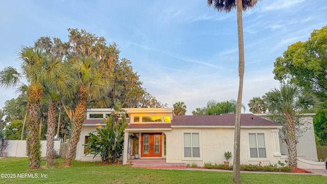 5491 River Trail Rd N, Jacksonville, FL 32277 - mid-century inspired home with stucco siding and french doors