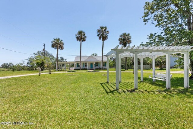 3060 Lewis Speedway, Saint Augustine, FL 32084 - view of community featuring a pergola and a yard