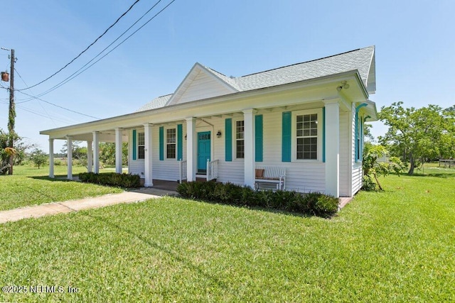3060 Lewis Speedway, Saint Augustine, FL 32084 - view of front of property featuring a porch and a front lawn
