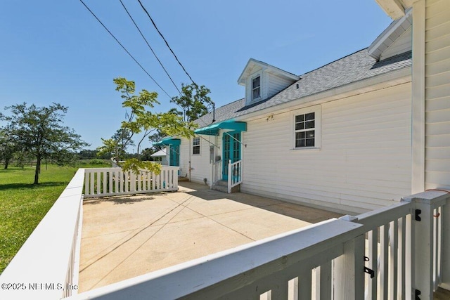 3060 Lewis Speedway, Saint Augustine, FL 32084 - wooden terrace with a patio area and entry steps