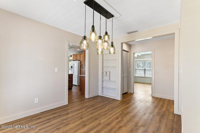3060 Lewis Speedway, Saint Augustine, FL 32084 - unfurnished dining area with wood finished floors and baseboards