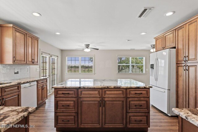 3060 Lewis Speedway, Saint Augustine, FL 32084 - kitchen featuring white appliances, a ceiling fan, dark wood finished floors, recessed lighting, and a center island