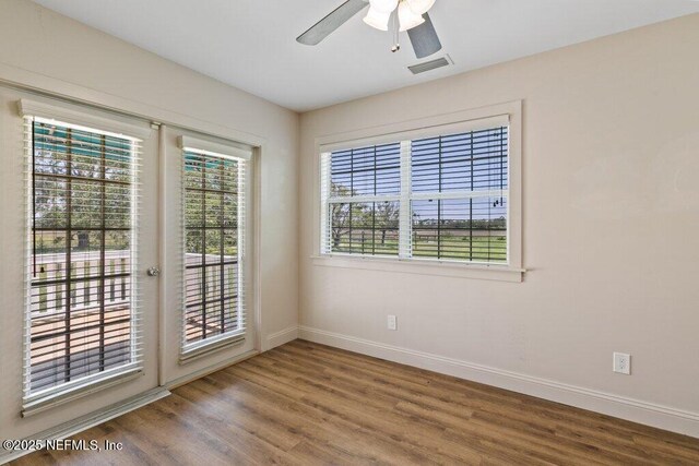 3060 Lewis Speedway, Saint Augustine, FL 32084 - spare room featuring wood finished floors, baseboards, and ceiling fan