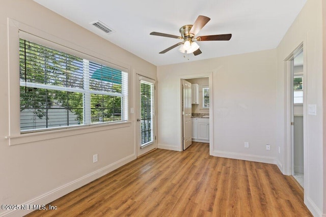 3060 Lewis Speedway, Saint Augustine, FL 32084 - spare room featuring light wood-type flooring, ceiling fan, and baseboards
